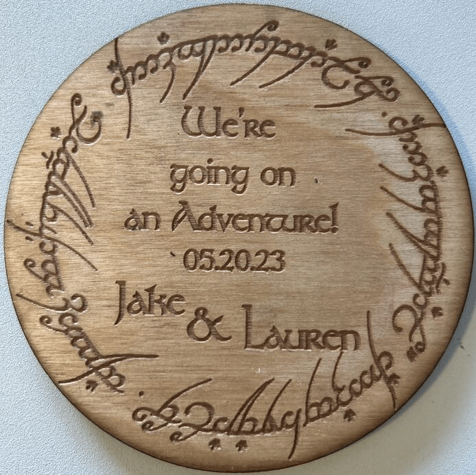 laser cut and engraved lotr save the date token