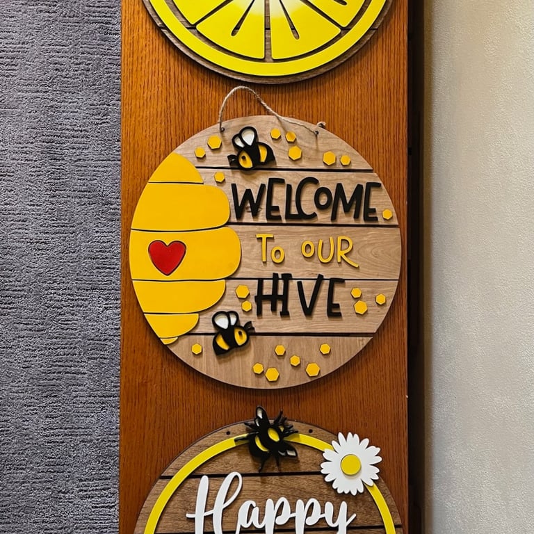laser cut and colorfully painted wooden door or wall hangers