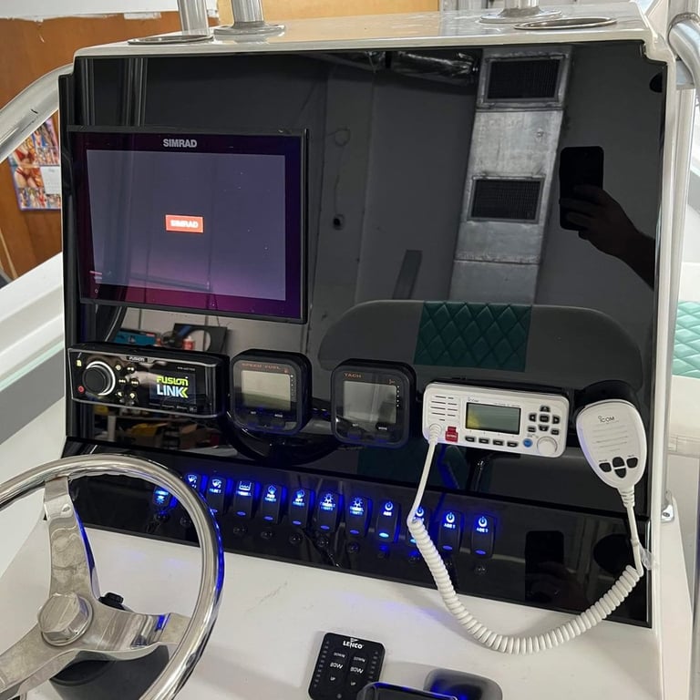 Upgraded boat control station with custom dashboard inlay with new electronics fitted 