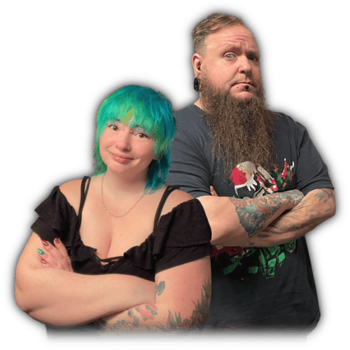 Aly Cat & Fecke stand back-to-back, arms crossed, in a transparent cutout photo showing tattoos & style.