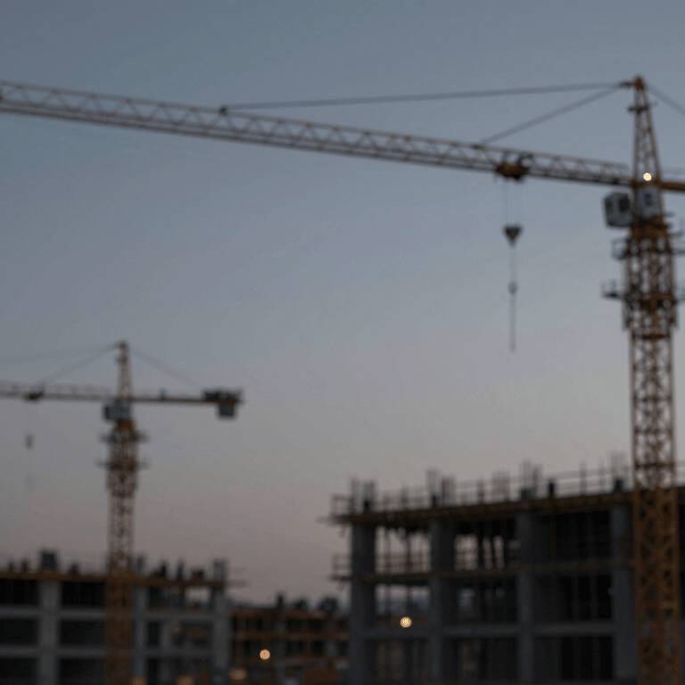 Wide shot of a modern bridge under construction, technical and clean aesthetic with a palette of #CFD8DC and #2D3E50.