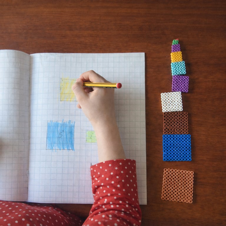 home educated child using montessori maths material