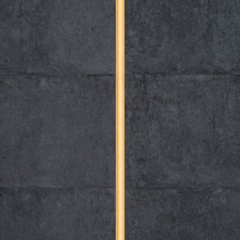 Architectural shot of a sleek, charcoal grey concrete wall with a thin strip of neon yellow light cutting through the center.