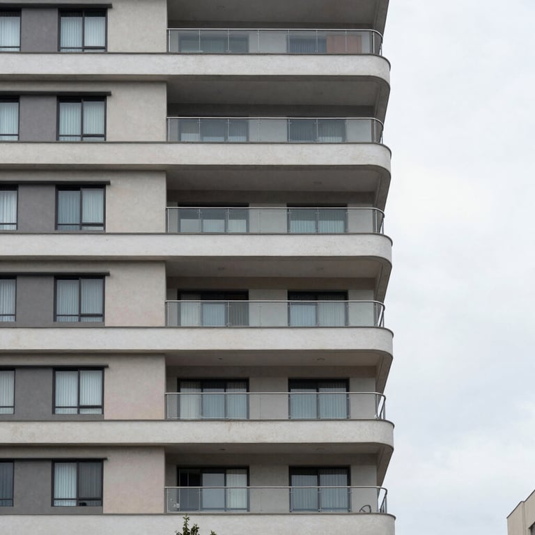 A modern residential building facade in Santa Catarina, Brazil, featuring clean lines and architectural precision.