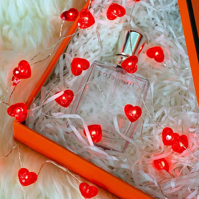 Red heart-shaped LED string lights with 40 LEDs, creating a sparkling and decorative effect.