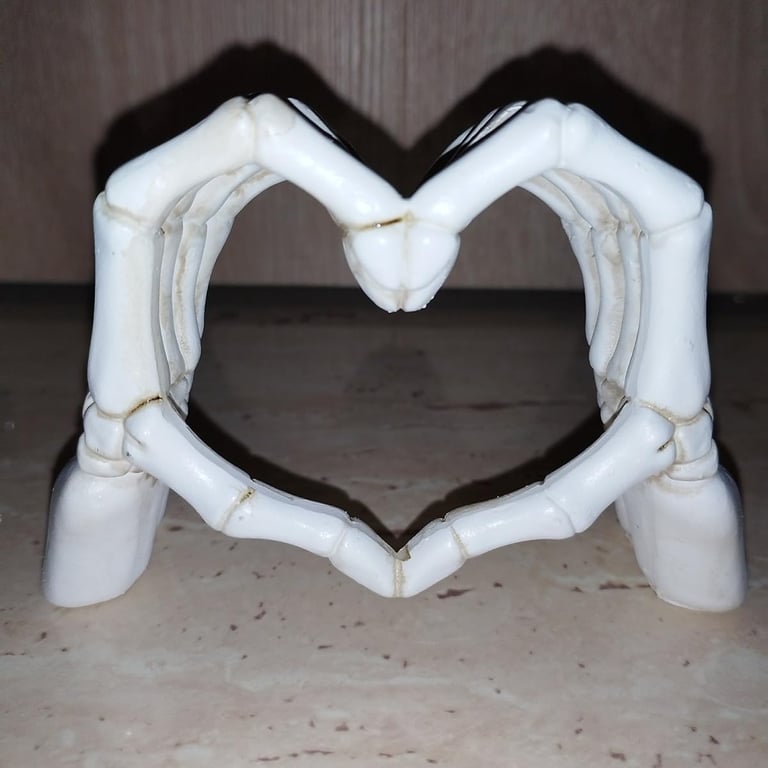 Resin skeleton hands forming a heart shape, Gothic Halloween decoration and romantic figurine 
