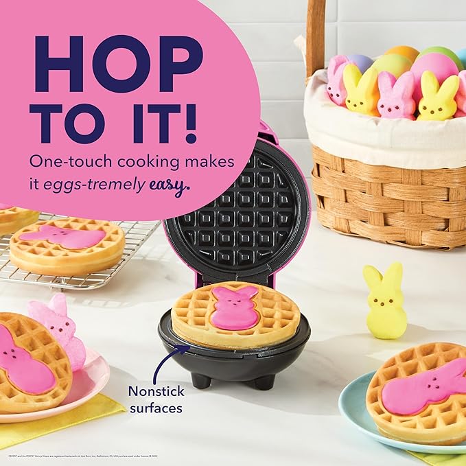 A pink mini waffle maker featuring the iconic PEEPS® bunny shape, perfect for making festive Easter 