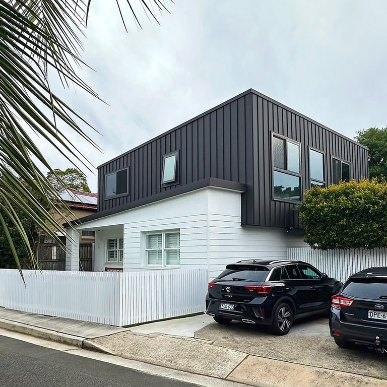 Award-winning Sydney architecture blending brutalist geometry with coastal Hampton-style warmth.