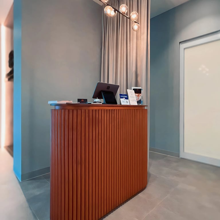 Minimalist reception at beauty salon interior with warm bronze accents