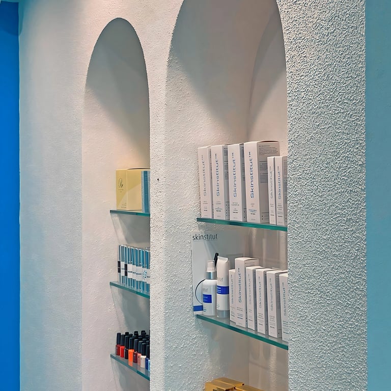 Textured arched niches for product display create a cave like illusion 