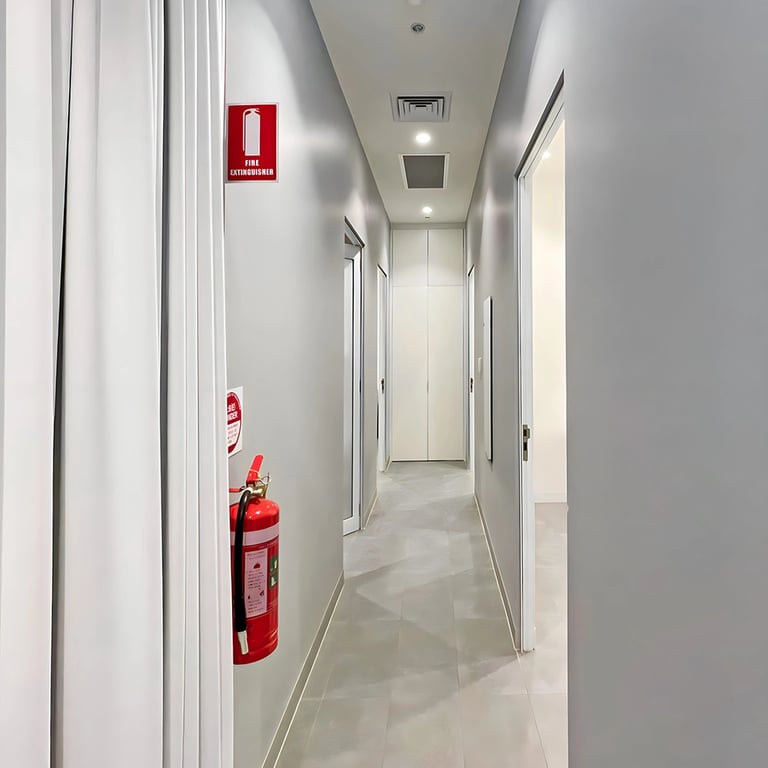 Floor-to-ceiling grey curtains in Bondi Junction beauty salon