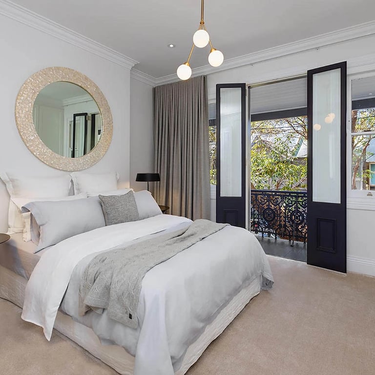 Maste suite with original verandah, retrofitted with original restored timber windows and door for indoor-outdoor flow
