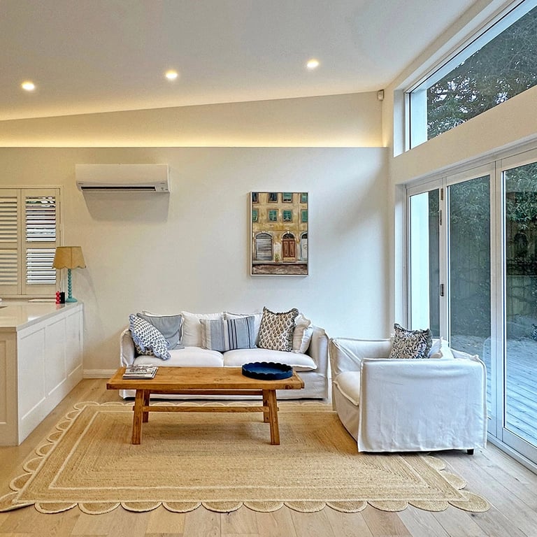 seamless indoor-outdoor living space with lush landscaping softening the home's architectural lines