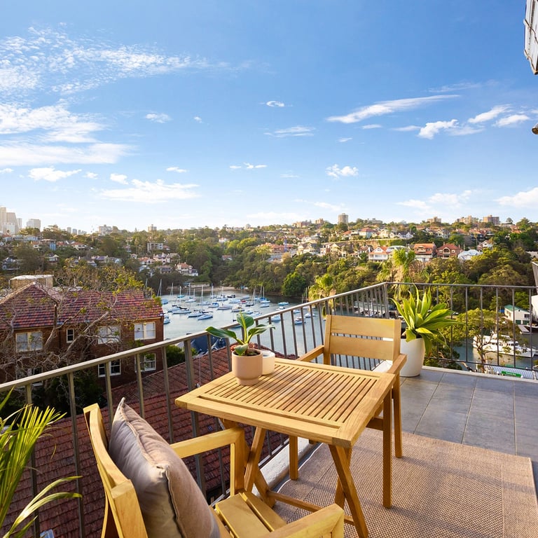 Teak custom made furniture on the balcony at Mosman Bat at the newly renovated apartment