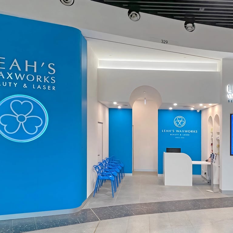 Beauty and Laser salon's shopfront, with main logo, pricing display, product display, reception and waiting areas.