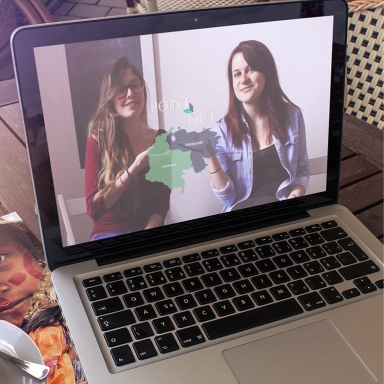 A laptop computer screen showing a picture of two women