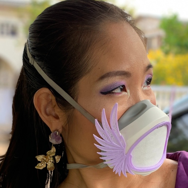 Female face with Flomask and Wings decoration