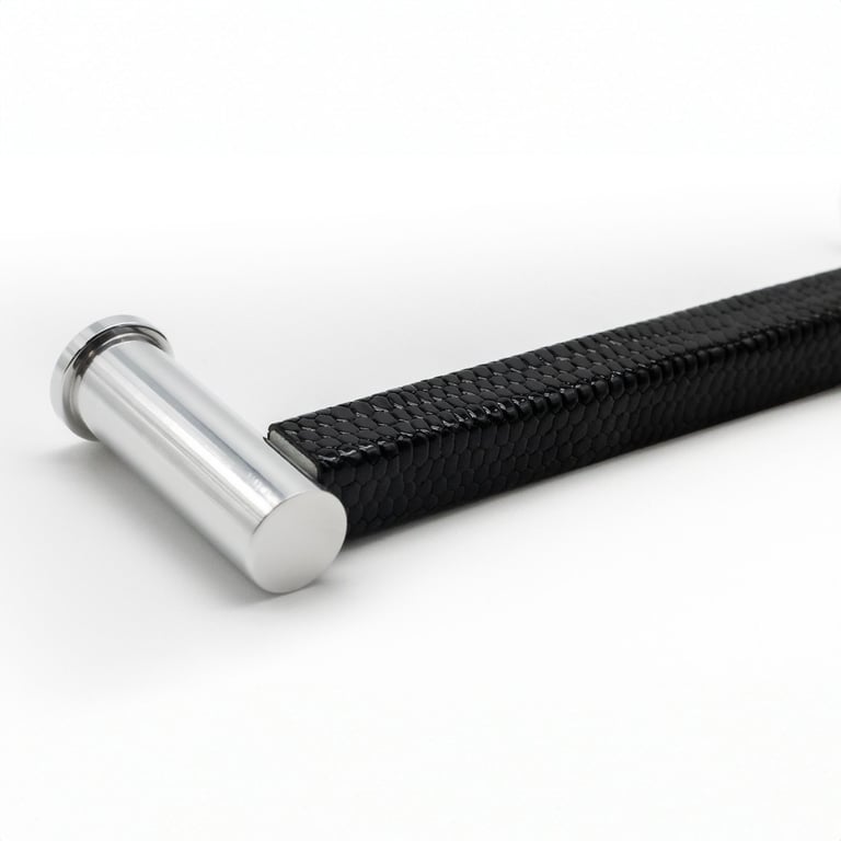 Photography case study featuring a cabinet pull with a leather wrap and silver metal finish.