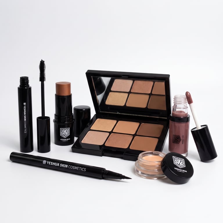 Yeshua Skin Cosmetics collection featuring neutral eyeshadow palette, mascara, liquid lipstick, and eyeliner.