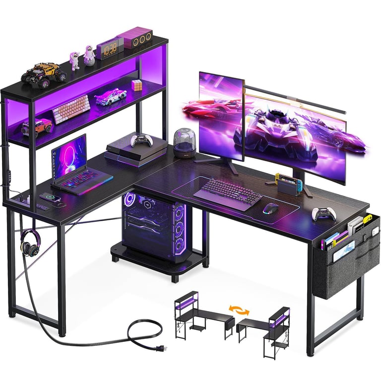 Modern L-shaped gaming desk with LED lights, dual monitor setup, and built-in shelving for PC gamers.