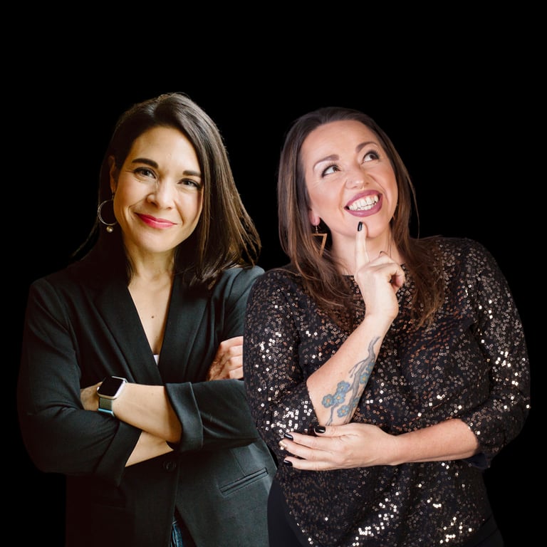two women standing next to each other with their arms crossed