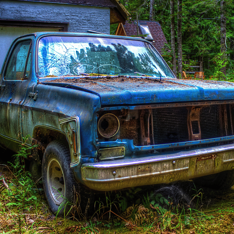 A blue truck parked in front of a Surrey house