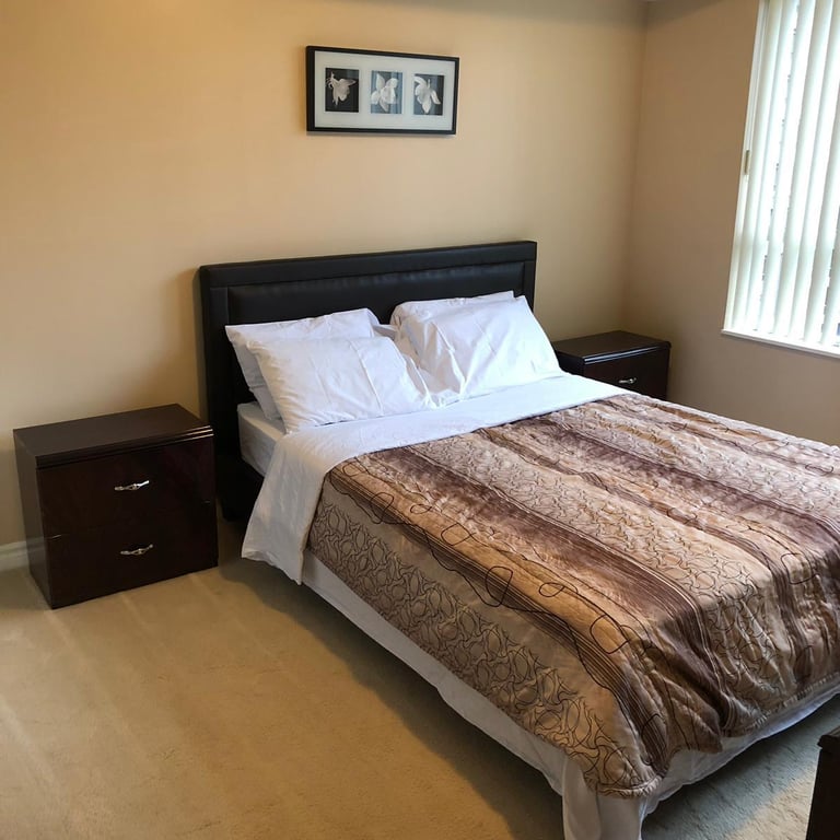 Spacious living room in furnished apartment near Square One Mississauga