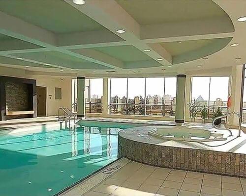 Kitchen appliances and countertop in furnished rental near Square One