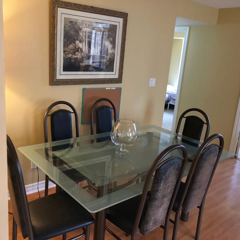 Dining area in fully furnished Mississauga apartment near Square One