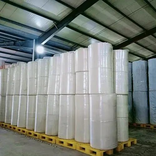 non-woven fabric rolls at warehouse