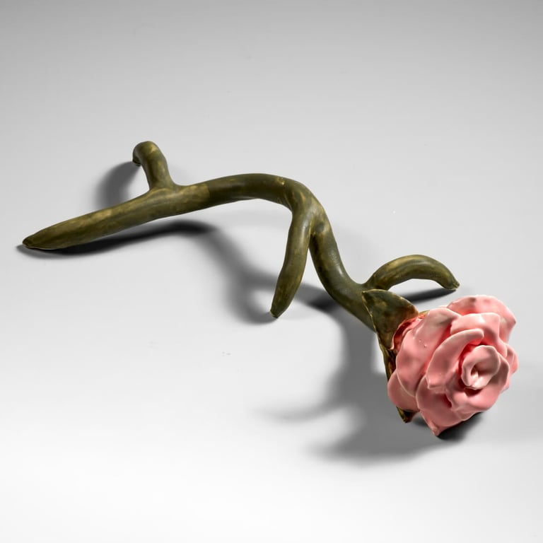 A porcelain rose. It reminds me of the traumas and scars I remember from my childhood. Memory. Decolonialism. Migration.