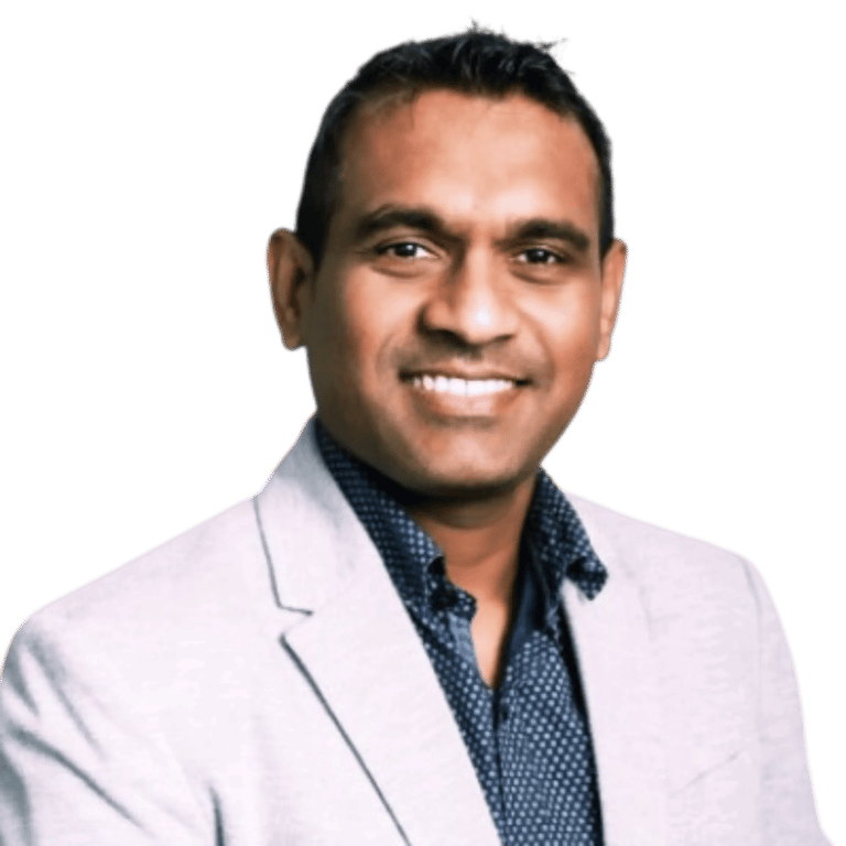 Ranil Fernando, Mortgage Agent Level 2 at MortgageWell Ontario, navy shirt and grey blazer smiling