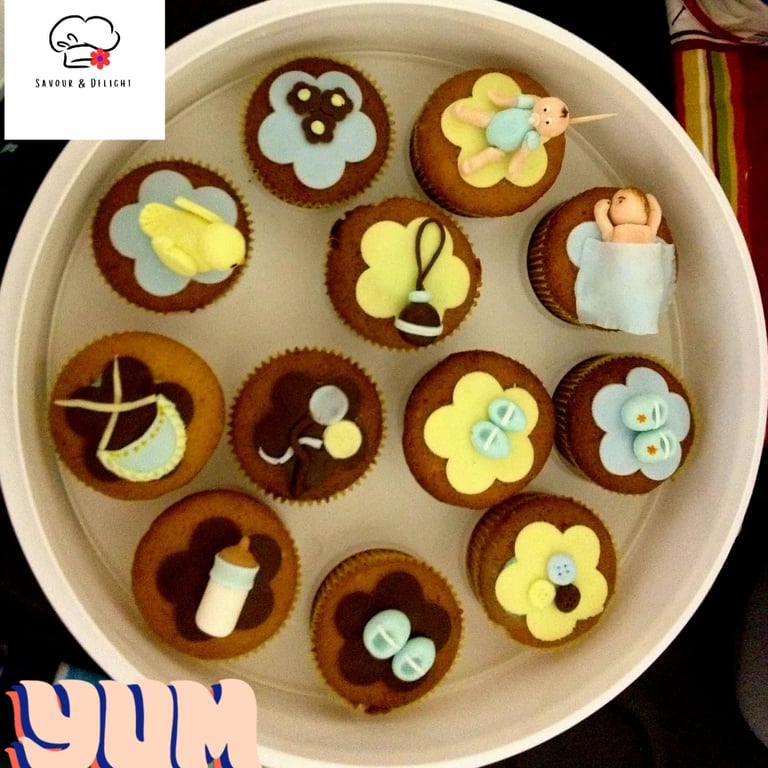 a plate of cupcakes with cupcakes and cupcakes