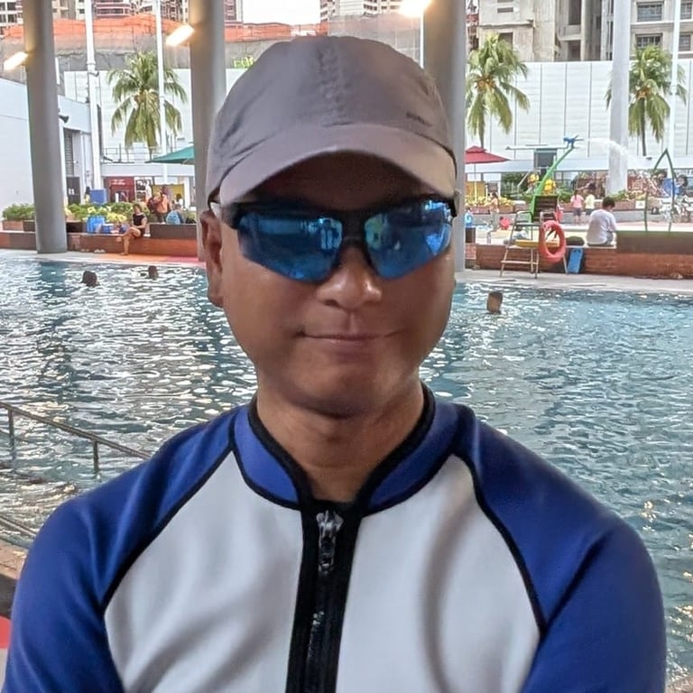 coach justin phua oyougu aquatics