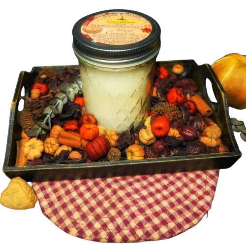 a rustic candle that is displayed with a farmhouse style potpourri bowl