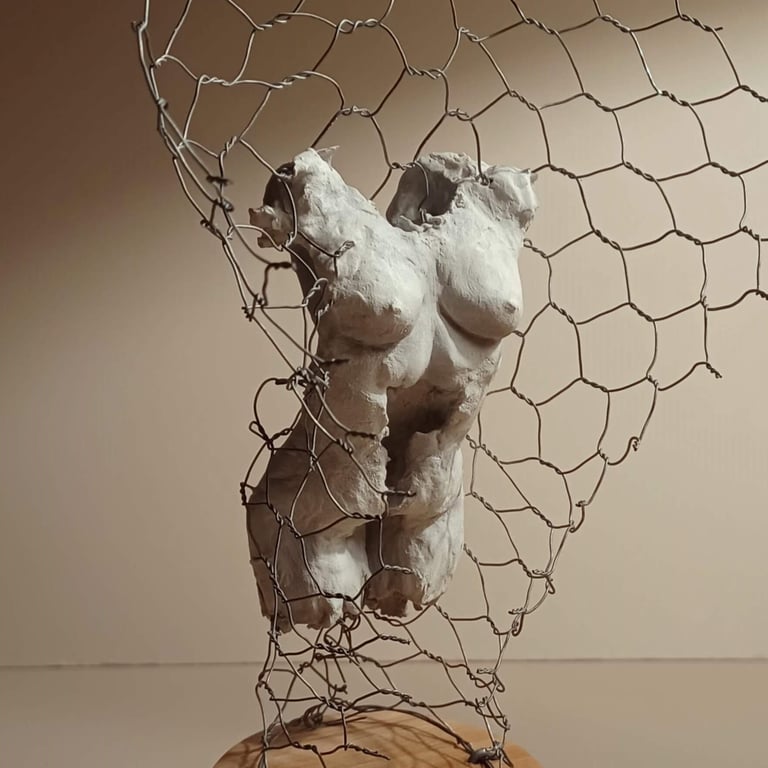 A clickable link leading to a page with information about the sculpture 'Ensconced'