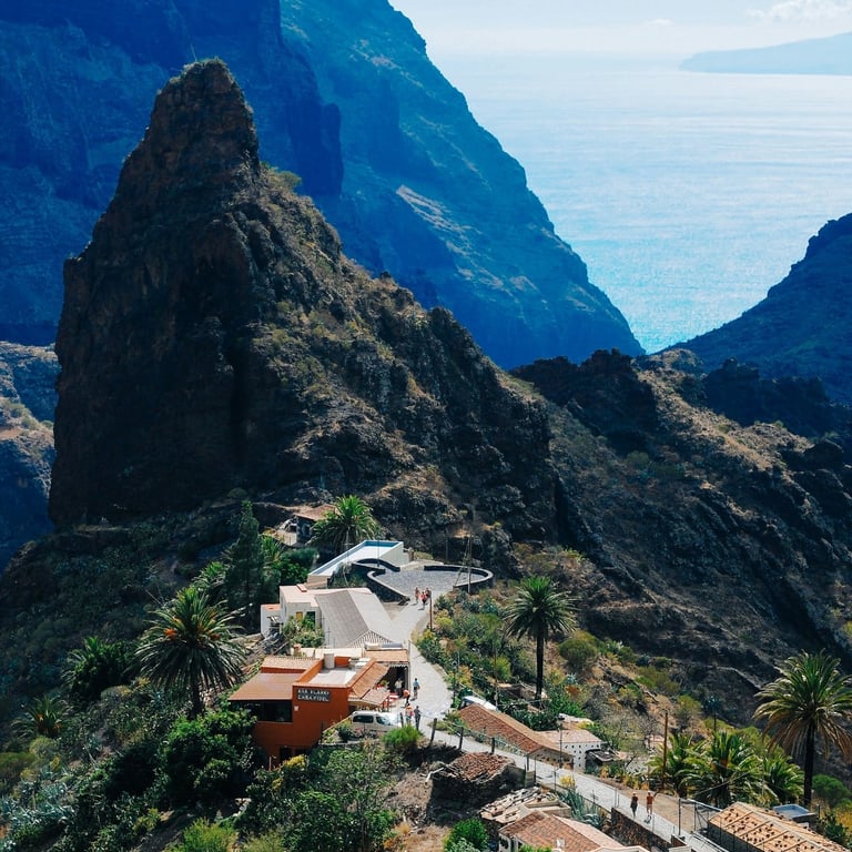 Masca mountain village among rocky cliffs and green valleys.