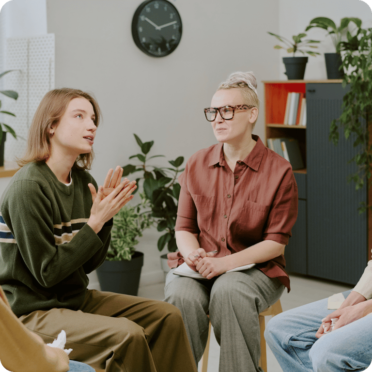 a group of people having a mindful session