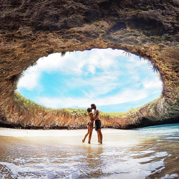 a couple kissing in a cave Marietas