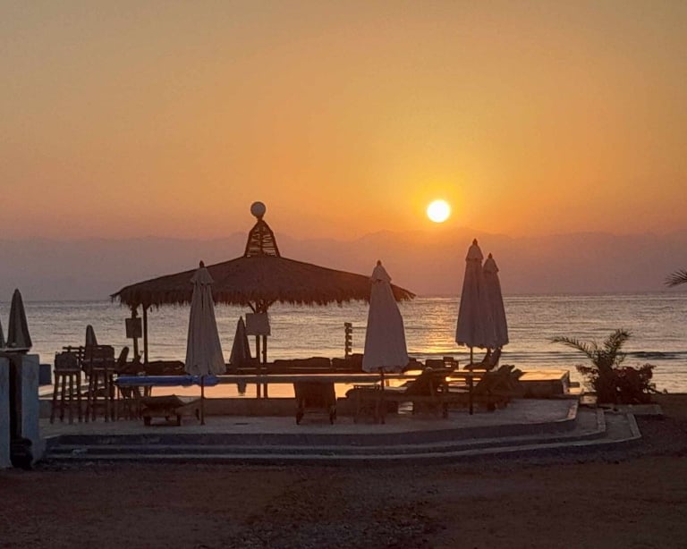 Sunrise view from the pool with sea view at Bedouin star