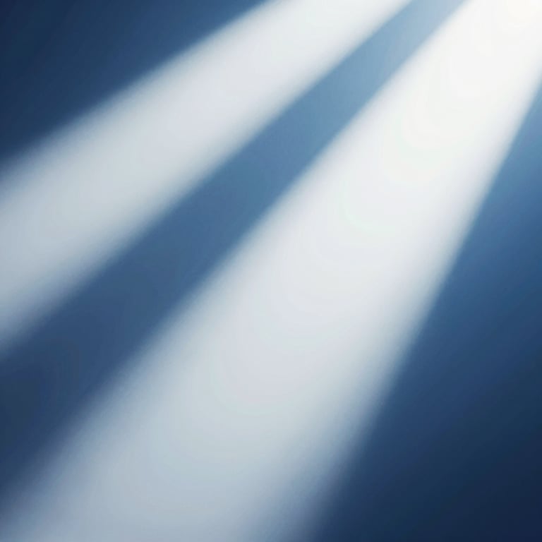 An abstract cinematic light leak in shades of blue and white, representing creative inspiration.