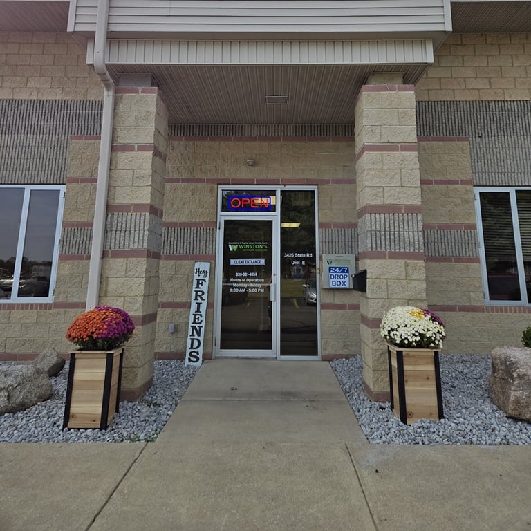 Front landscaping and entrance at Winston's Complete Auto Care in Cuyahoga Falls, Ohio