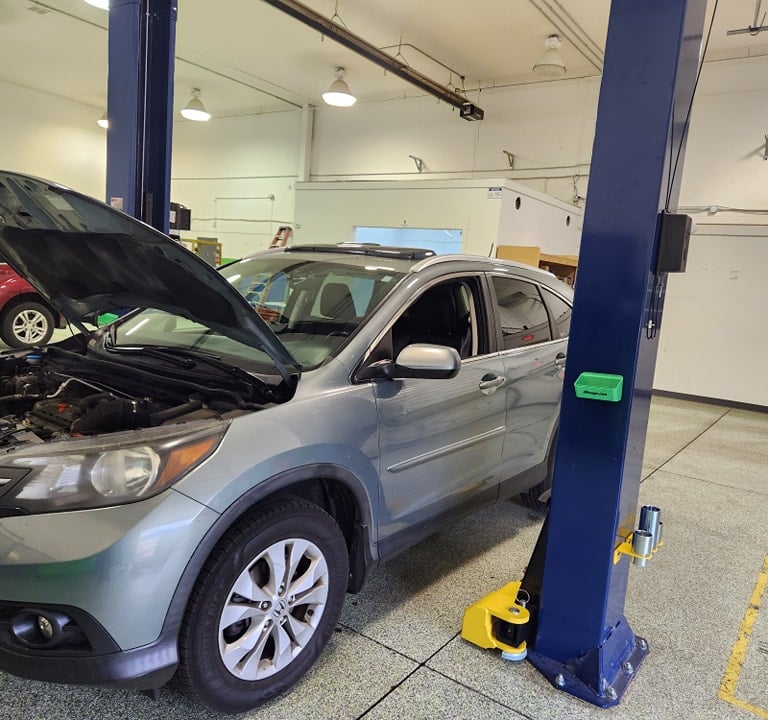 Car in service at Winston's Complete Auto Care in Cuyahoga Falls, Ohio