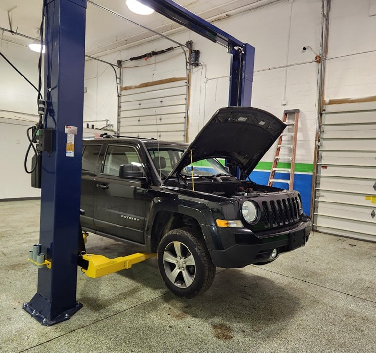 Jeep Patriot being serviced at Winston's Complete Auto Care in Cuyahoga Falls, Ohio
