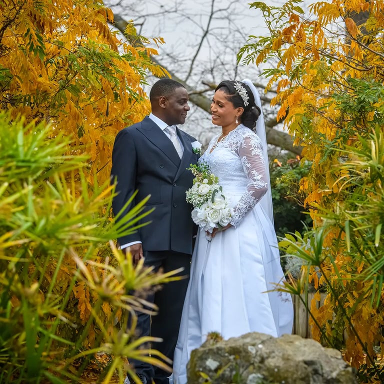 Wedding couple posing for a photograph 