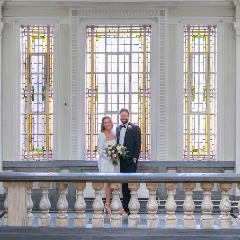 wedding couple standing in Islington Town Hall