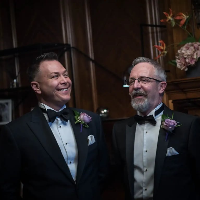 two grooms during their wedding ceremony