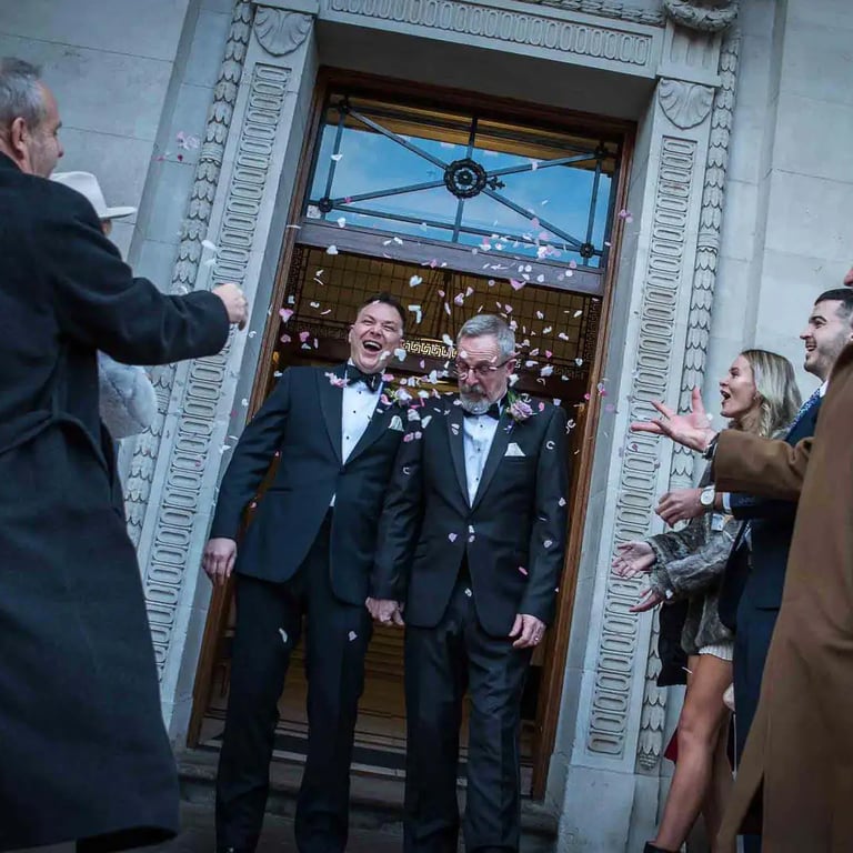 wedding couple having their confetti moment