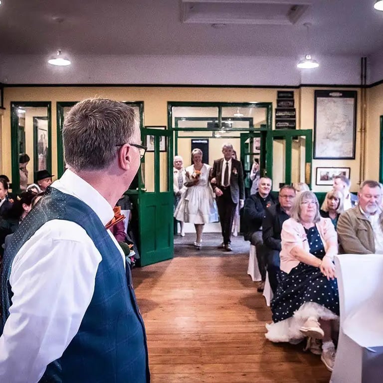 groom waiting for his bride