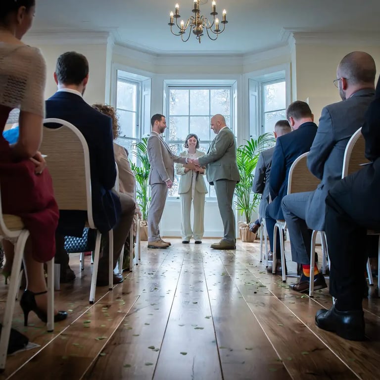 two grooms being married at their ceremony